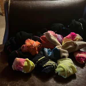 21 pairs of various multi colored booties- gently used